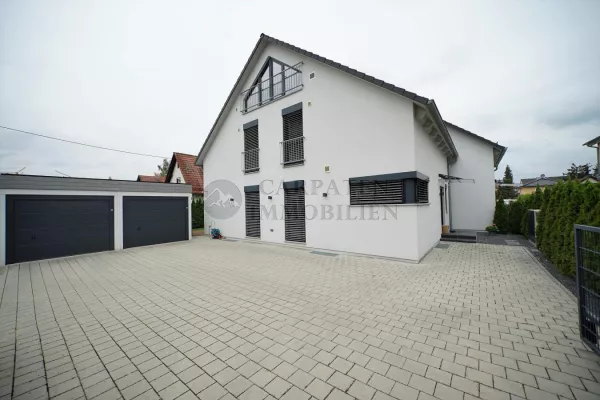 Doppelhaushälfte mit Garten, Terrasse, Garagen und Keller kaufen in 82140 Olching